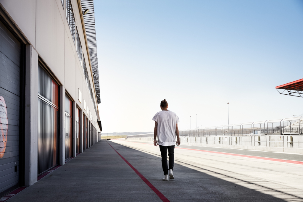 Porsche Panamera E-Hybrid and Composer Jimek on a racetrack
