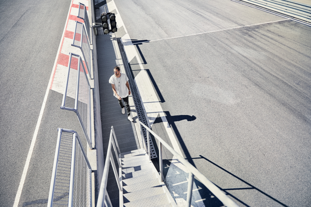 Porsche Panamera E-Hybrid and Composer Jimek on a racetrack