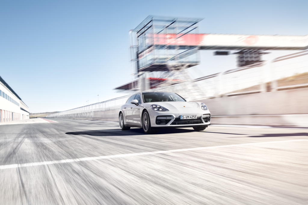 Porsche Panamera E-Hybrid and Composer Jimek on a racetrack