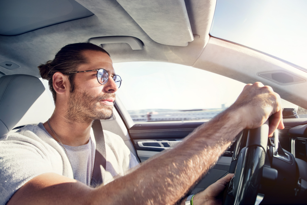 Porsche Panamera E-Hybrid and Composer Jimek on a racetrack
