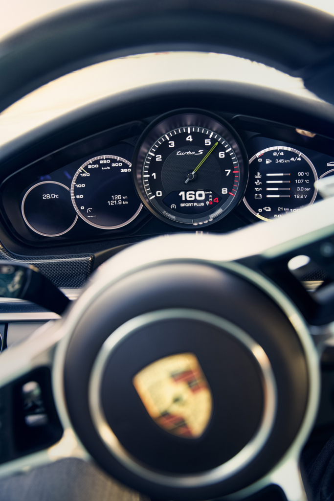 Porsche Panamera E-Hybrid and Composer Jimek on a racetrack