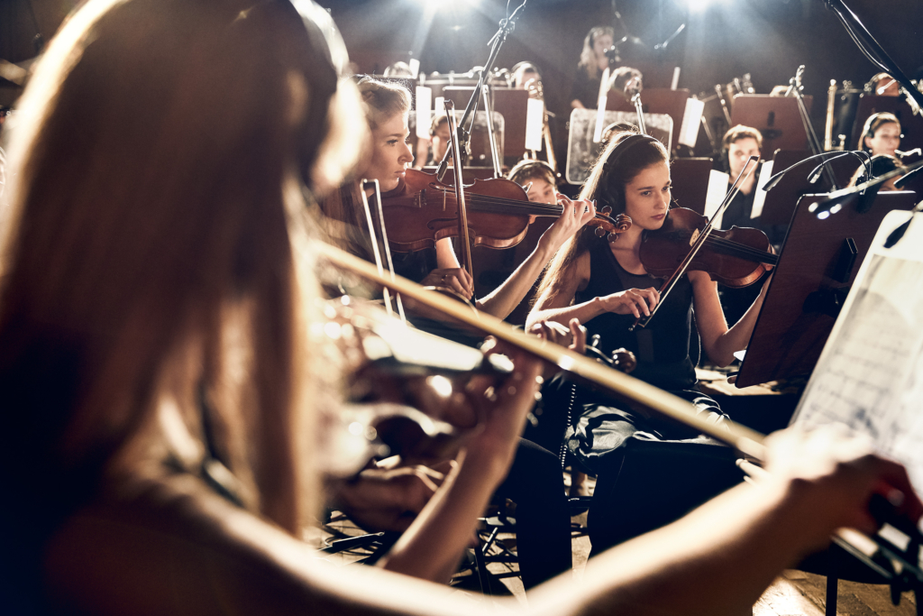 Composer and Musician Jimek with his orchestra