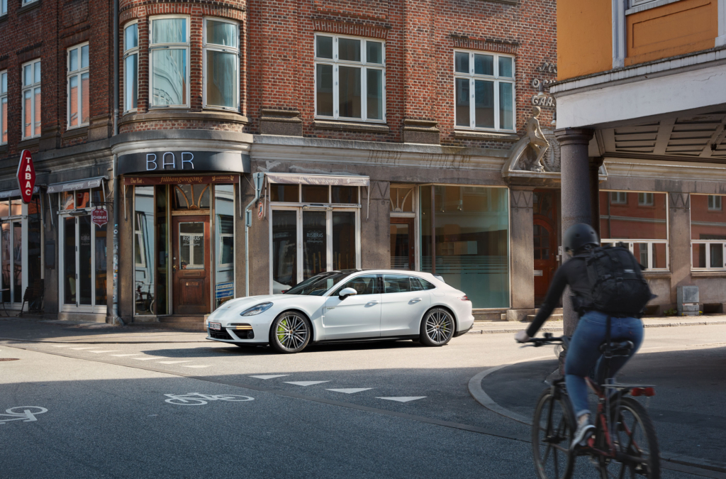 Professional racing driver Christina Nielsen with a Porsche Panamera E-Hybrid in Aarhus