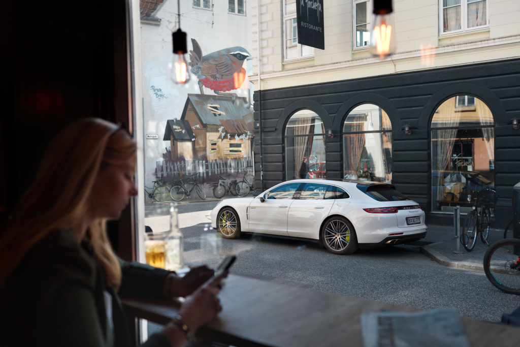 Professional racing driver Christina Nielsen with a Porsche Panamera E-Hybrid in Aarhus
