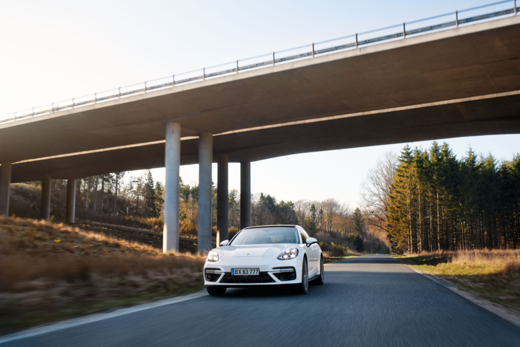 Professional racing driver Christina Nielsen with a Porsche Panamera E-Hybrid in Aarhus
