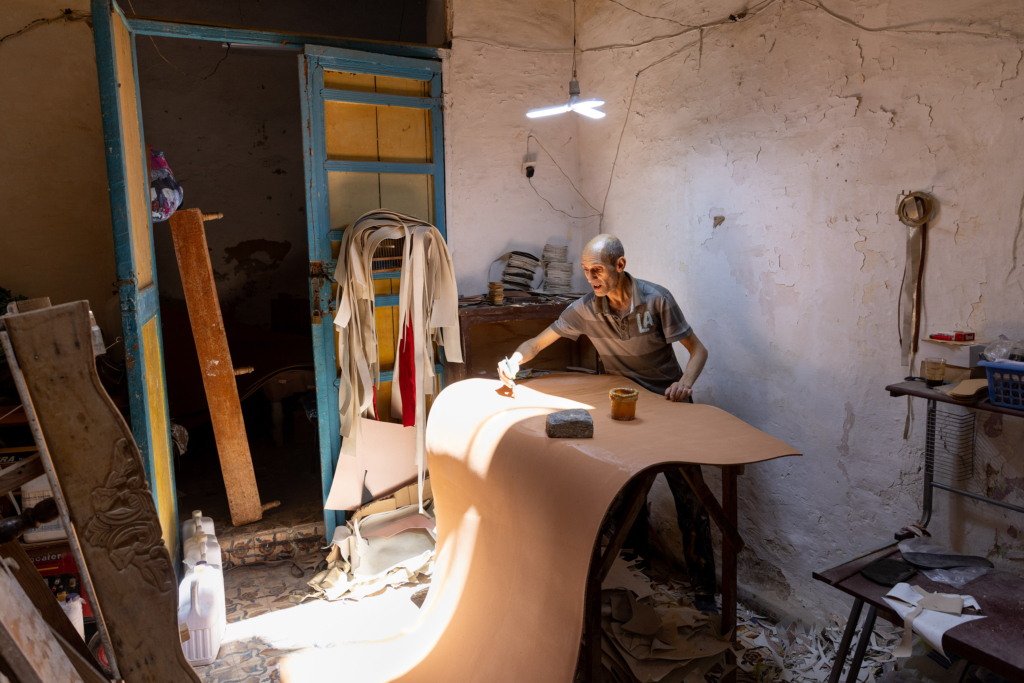 Fez, Morocco, has a long tradition of arts and crafts. I visited and photographed artisans from a variety of fields in their workshops. Leather-work.